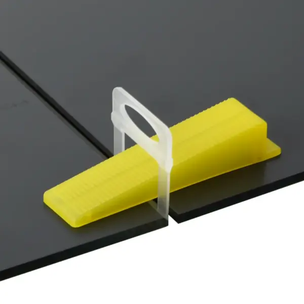 Plaatide tasandussüsteemi kiilud, korduvkasutatav komplekt 500 tk, kollane PP, 89 x 22 x 16,5 mm – 2