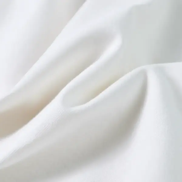 Volangidega laste T-särk sädelevate detailidega, ekrüü, suurus 140 – 8