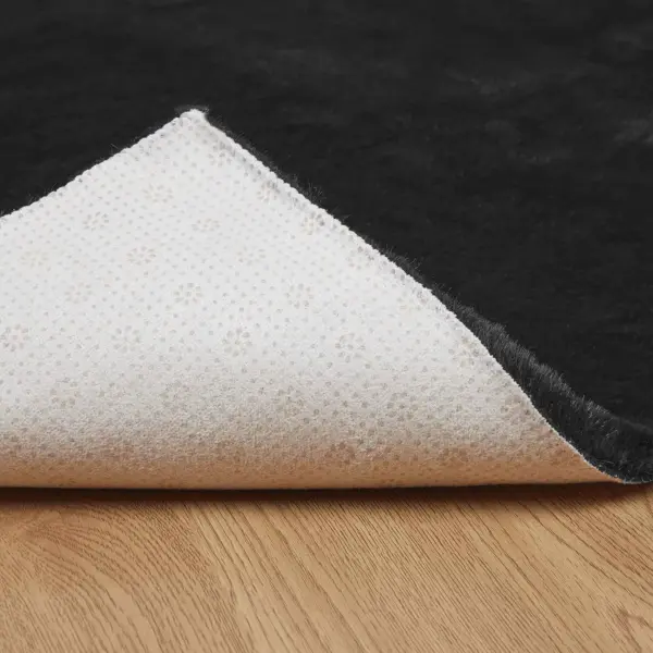 Libisemiskindel kunstküüliku karva vaip Olite, must, 100 x 200 cm – 8