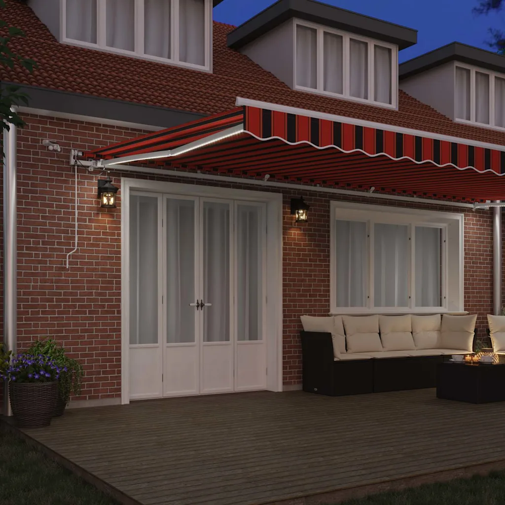 Sissetõmmatav LED-valgustusega terrassimarkiis, oranž-pruun, polüester, 600 x 300 cm
